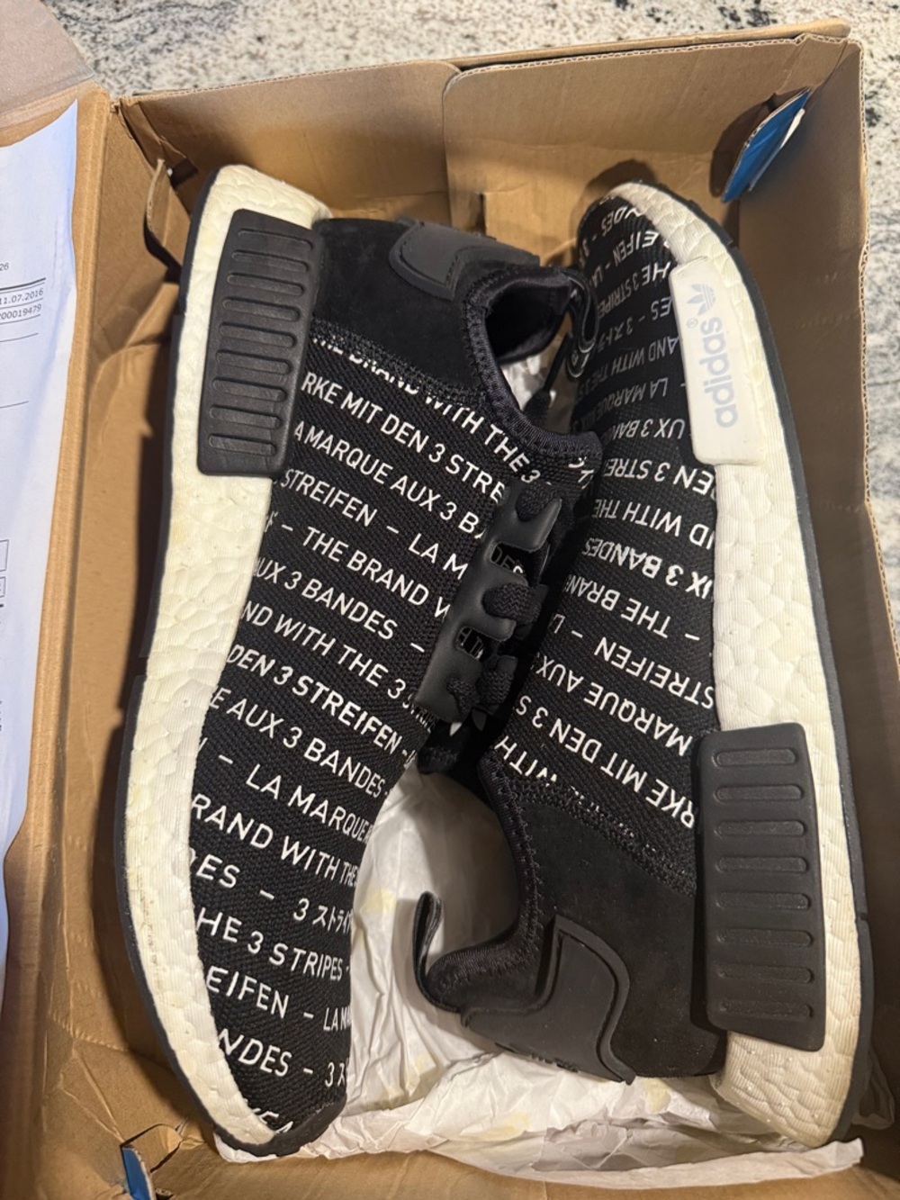 adidas NMD R1 “Blackout” Sneakers